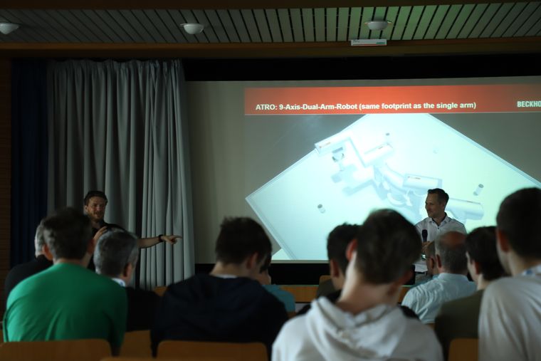 A speaker giving a talk at ECER